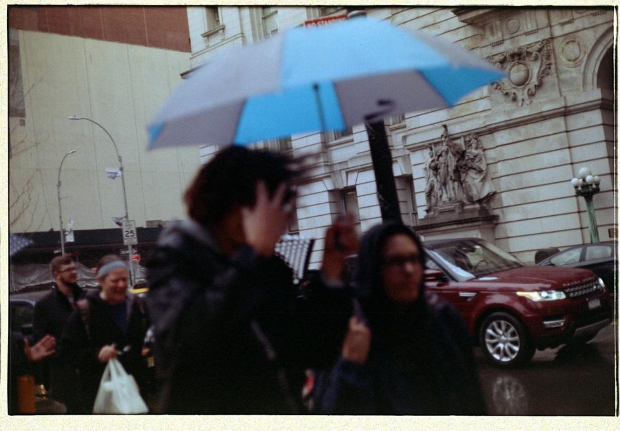 Picture of friends under umbrella